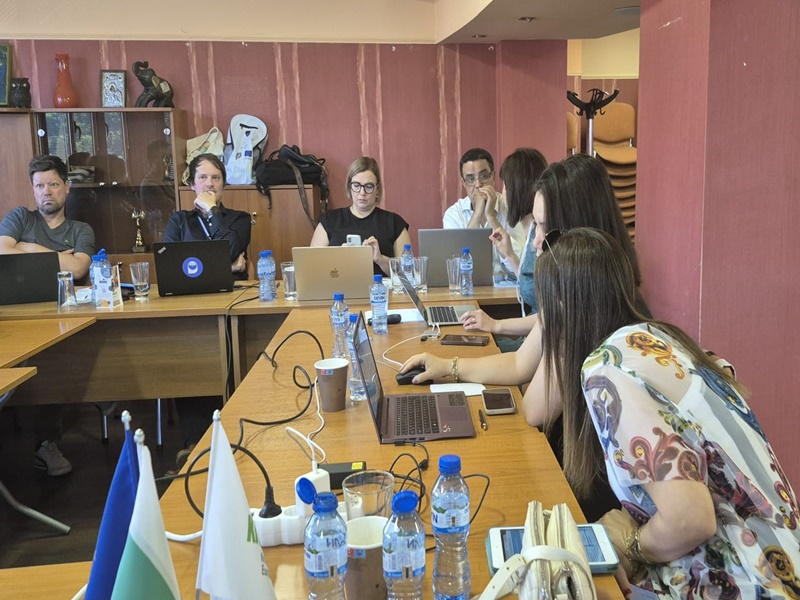A group of people sitting at a table
